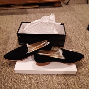 Black slip-on suede shoes